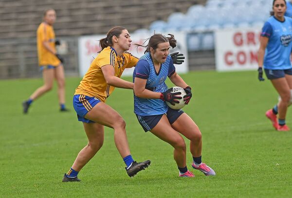 Westport's Aoife Staunton tries to get past Knockmore's Roisin Flynn during Sunday's county final in Castlebar. Westport's Aoife Staunton tries to get past Knockmore's Roisin Flynn during Sunday's county final in Castlebar.