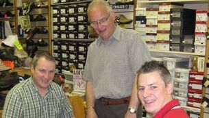 <p>Tom Finn with sons, Austin and Paul.</p>