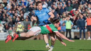 <p>Padraig O'Hora of Ballina Stephenites attempts to prevent Lee Keegan from scoring in last Sunday's Connacht Gold Mayo SFC Final at Hastings Insurance MacHale Park in Castlebar. Keegan did in fact land Westport's opening score but the tackle resulted in both he and O'Hora departing the match through injury.	Picture: Martin McIntyre</p>