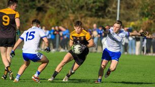 <p>Gavin Duffy of Enniscrone-Kilglass makes for a gap in the Coolaney-Mullinabreena defence during last Sunday's Sligo IFC final in Kilcoyne Park, Tubbercurry.	Pictures: Lauren Fitzgerald</p>