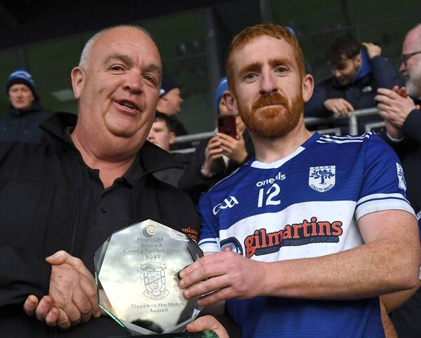 Brian Gallagher received the Player of the Match award from Sean Julian of championship sponsors Treanlaur Catering. Brian Gallagher received the Player of the Match award from Sean Julian of championship sponsors Treanlaur Catering.