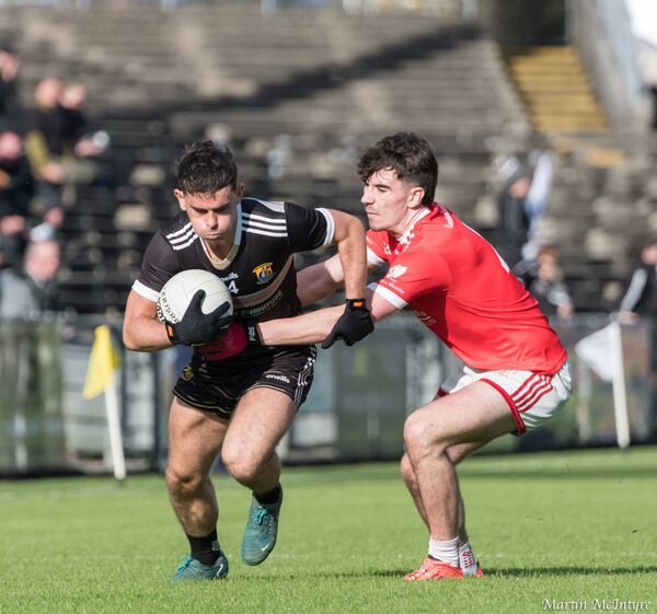 Kilmeena's John McGlynn takes on Jack Dunleavy of Moy Davitts. Picture: Martin McIntyre