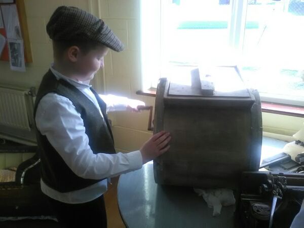 Churning butter at Ballycastle National School in North Mayo on Proclamation Day in 2016.