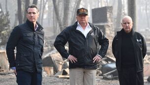 <p>US President Donald Trump looks on with Governor of California Jerry Brown (right) and Lieutenant Governor of California, Gavin Newsom, as they view damage from wildfires in Paradise, California on November 17, 2018. Trump and Newsom are now bitter enemies as the Republicans and Democrats seek electoral advantage ahead of the 2026 midterm elections. Picture: Saul Loeb/AFP/Getty Images</p> <p>US President Donald Trump looks on with Governor of California Jerry Brown (right) and Lieutenant Governor of California, Gavin Newsom, as they view damage from wildfires in Paradise, California on November 17, 2018. Trump and Newsom are now bitter enemies as the Republicans and Democrats seek electoral advantage ahead of the 2026 midterm elections. Picture: Saul Loeb/AFP/Getty Images</p>