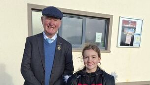 <p>Ceola Quinn, Swinford who sang the National Anthem at the AIB Connacht LGFA Junior Club Championship Final in Swinford Amenity Park on Saturday November 1, pictured with Connacht LGFA President Brendan Cregg. </p>