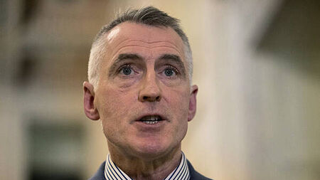 Sinn Féin party member expelled after partner arrested in far-right probe