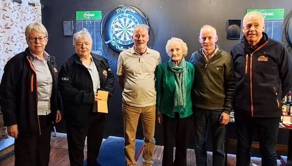 The Pete Lavelle Memorial Darts Tournament was held recently and pictured are Mrs Lee Lavelle and her sons Jimmy and Gerry and members of the volunteer fundraisers from Ballyglass RNLI. Ballyglass RNLI were co-recipients of the proceeds along with Pullathomas Graveyard Committee. 