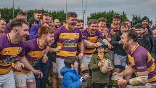 <p>Ballyhaunis RFC celebrating with the Curley Cup, named after club stalwart Hugh Curley. Picture: Ciara Buckley/Memories Thru A Lens</p>