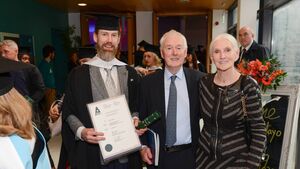Congratulations: Mayo man celebrates graduation with family