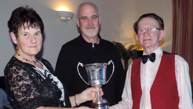 <p>Winners of the Tony and Bernie Towey Perpetual Cup at the dance competition which was held in the Brusna Inn, were Mary Small and Ronan Kelly being presented with the cup by Gerry Towey. Picture James Hunt Photography.</p>