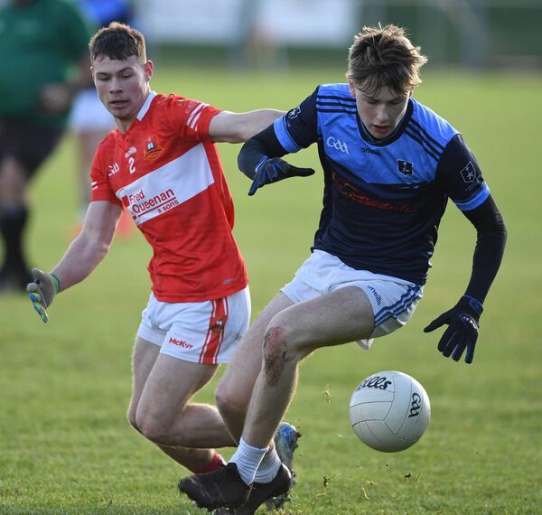 St Muredach’s Cathair Tighe in action against Ross Connolly of St Gerald's. Picture: David Farrell Photography