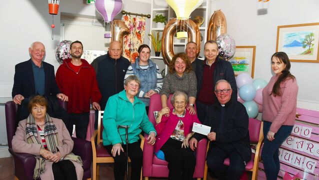 <p>Margaret Barrett is pictured celebrating her 100th birthday at Sonas Moy Ridge Nursing Home in Ballina. Back row, from left: Liam Doyle, Gerry Lydon, David Lydon, Marion Simmons, Geraldine Barrett, John Lydon, Padraic Walsh and Sarah Carolan. Front row: Nuala Doyle, Madge Carolan, Margaret Barrett and Fr Frances Judge.	Picture: John O'Grady</p>