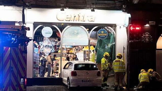 Car smashes into front of busy Dublin city centre convenience store