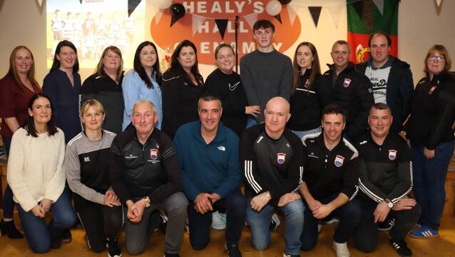 <p>Kobe McDonnell of Crossmolina GAA Club with under age coaches and managers at the recent Cill Chomáin Bord na nÓg awards in Glenamoy.</p>
