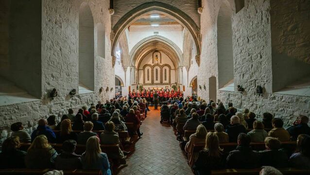 <p>The performing choirs and the packed attendance  at the recent November Harmonies event in Ballintubber Abbey.</p>