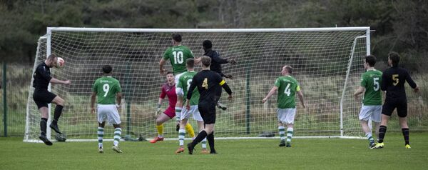 Strand Celtic dangerman, Leo Doherty, heads home unchallenged at the back post, to put his side in front. Strand Celtic dangerman, Leo Doherty, heads home unchallenged at the back post, to put his side in front.