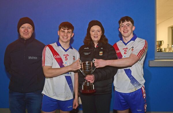St Jarlath's joint captains Conor Henry and Darren Concannon accept the Mayo U21 trophy from Mary Lydon Mayo GAA, alongside sponsor Tom McHale, McHale Agri Forest and Garden. Picture: Conor McKeown St Jarlath's joint captains Conor Henry and Darren Concannon accept the Mayo U21 trophy from Mary Lydon Mayo GAA, alongside sponsor Tom McHale, McHale Agri Forest and Garden. Picture: Conor McKeown