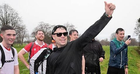 Kneecap’s Móglaí Bap greeted by President Connolly during charity run