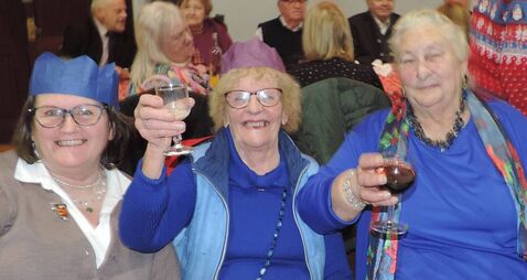 Local Notes: The ladies enjoy Christmas Community Dinner in Kilmovee Community Centre.