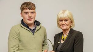 <p>Gavin Hopkins from Shanvallybeg, Drummin, Westport, whose exceptional carpentry skills earned him a place among the country’s top apprentices at WorldSkills with Minister of State at the Department of Further and Higher Education, Research, Innovation and Science, Marian Harkin TD.</p>