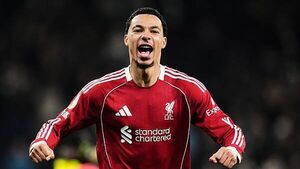 Liverpool hold off late challenge for dramatic win over nine-man Tottenham