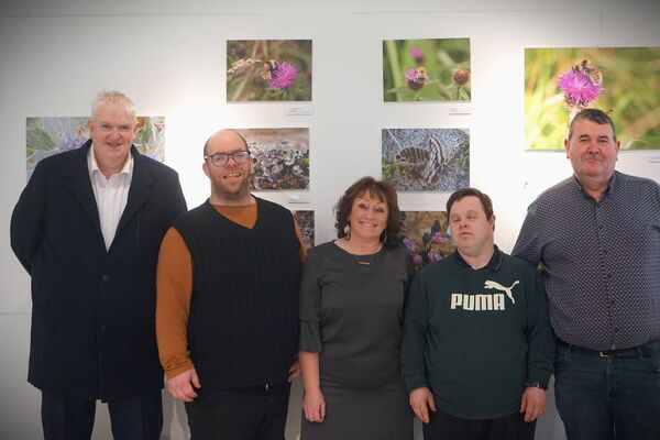 At the recent launch of ‘I Measc na mBláth’ in Áras Inis Gluaire, Belmullet were, from left: John Reilly, Michael Sayers, Mary Keenaghan, Peter Langan, and John McIntyre. 