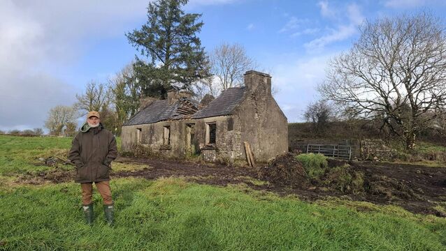 <p>Trevor Jeffreys outside the derelict house at Brackloon, near Ballyhaunis, which he intends to renovate. </p>