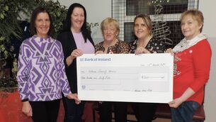 <p>At a recent Kilmovee Ladies Club gathering, Maura Gallagher and Trisha Duffy accept a cheque on behalf of Kilmovee Meals on Wheels from Ladies club members Mary Teresa Duffy, Mary McDermott and Kathleen O'Connor.	Picture: James Hunt Photography</p>