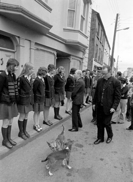 President Cearbhall Ó Dálaigh chats with students from St Louis Community School on his visit to Kiltimagh in 1975. A couple of local four-legged friends also wanted to meet the President! 	Picture: Western People Archives