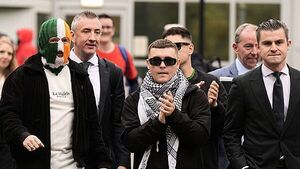 Kneecap ‘will not be silent’ over appeal against decision to end terror case