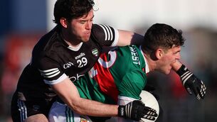 <p>Jordan Flynn of Mayo holds off Sligo's Luke Towey in a previous encounter between the neighbours.	Picture: INPHO/James Crombie</p>