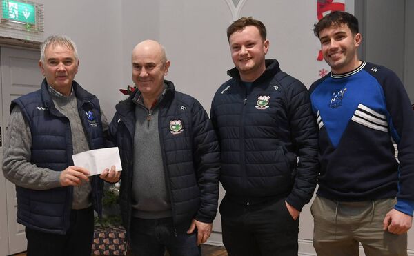 Neighbouring Aghamore GAA club, for whom many of the Tooreen hurlers play football, has made a generous donation of €1500 towards Tooreen's All-Ireland fund. Derry Cox and Adam Byrne made the presentation on behalf of Aghamore GAA last Sunday morning at Tooreen Hall in the company of Tooreen secretary Austin Kenny, far left, and Tooreen captain Daniel Huane, far right.	Picture: David Farrell Photography 