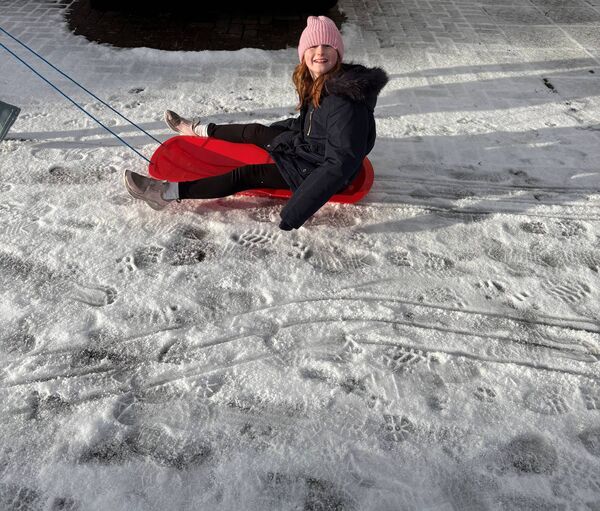 Nicole O’Malley gets a lift to the shop - David O'Malley. Nicole O’Malley gets a lift to the shop - David O'Malley.