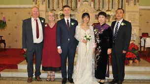 <p>While home on holiday for Christmas, Chris and Joanne celebrated an Irish marriage blessing in St Michael's church, Foxford, by Fr Costello.</p>