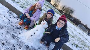 Local Notes: Gilmartin children build snowman in Bonniconlon last week.