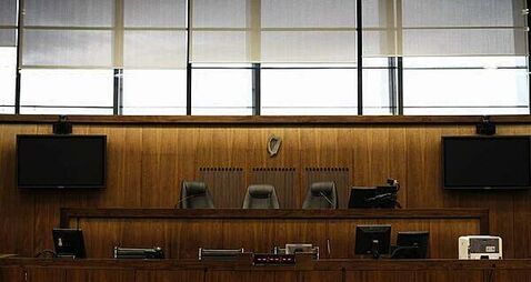 Man (24) pleads guilty to knife attack on garda and arson of Conor McGregor's pub