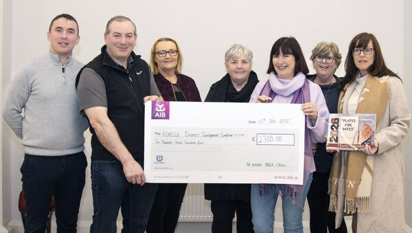 The Kitchen Table Crew committee, Kilkelly (Phil Noyes, Carmel Williams and Nuala Lyons) presenting a cheque of €2300 to Kilkelly District Development Committee Keith Cassidy, Noel Duffy, Patricia Byrne and Susan Gurren from the proceeds of the 2026 Charity Calendar.
