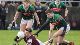 <p> Brian Cogger of Galway is tackled by Darragh Joyce and Nathan Moran of Mayo in Sunday's FBD Connacht Senior Football League Final.	Picture: INPHO/Andrew Paton</p>