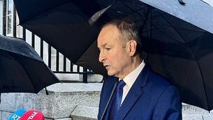 Man arrested in connection to robbery of business in Cork