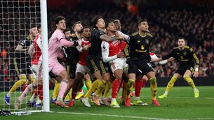 <p>The players of Arsenal and Manchester United compete for an incoming ball during the Premier League match at Emirates Stadium last Sunday.	Picture: Alex Pantling/Getty Images</p>