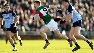 <p>Mayo's David McBrien goes past Ethan Dunne of Dublin during Sunday's NFL Division 1 match in Castlebar.	Picture: INPHO/Laszlo Geczo</p>