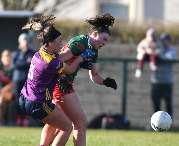 Mayo’s Aoife Geraghty and Wexford’s Aoife Tormey chase the ball. Picture: David Farrell Mayo’s Aoife Geraghty and Wexford’s Aoife Tormey chase the ball. Picture: David Farrell