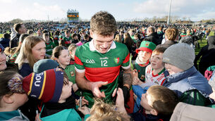 <p>Mayo's Jordan Flynn signs autographs after last weekend's win against Dublin.	Picture: INPHO/Laszlo Geczo</p>
