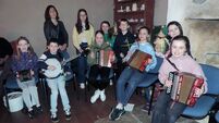 Local Notes: Kilmovee NS pupils perform as 'Na Brideogi' at Kilmovee Comhaltas session.