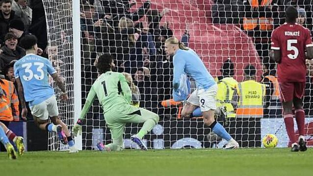 Late Erling Haaland penalty keeps Man City in title race as they beat Liverpool