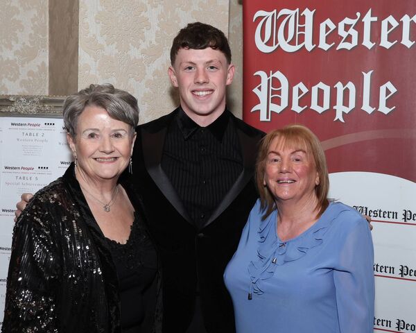 Mark Conroy from Ballina with his grandmothers Mary Whittington and Rose Conroy. Mark was the recipient of the swimming award at the Mayo Sports Stars gala presentation banquet in Breaffy House Hotel.
