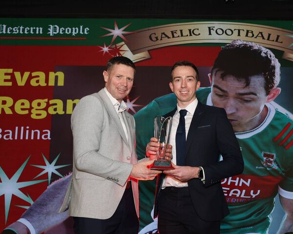 Tomás Ó Sé presented Ballina Stephenites' Evan Regan with the Gaelicn football award at last Saturday night's Western People Mayo Sports Stars Awards. Picture: Michael Donnelly