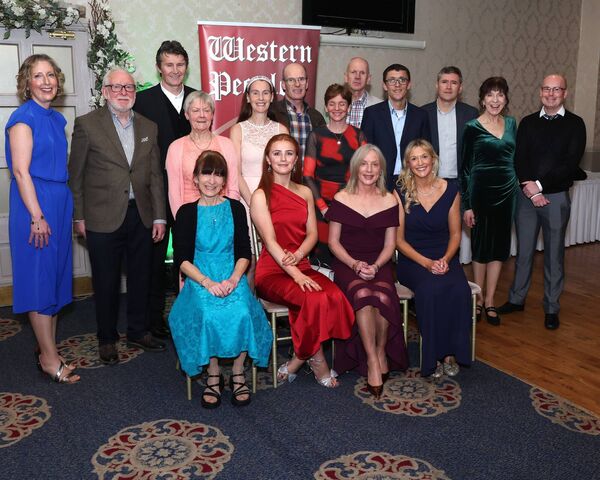 Castlebar runner Colette Tuohy, front row, second from right, with family and friends at Saturday's Mayo Sports Stars Awards where she was presented with the special achievement award.