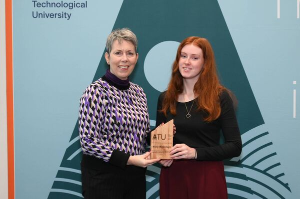 Kiltimagh’s Molly Mc Donagh is presented with her Entrance Scholarship Award by Dr Orla Flynn, ATU President. She is studying Art &amp; Design &amp; Communication Graphics and is a past student of St Louis Community School.