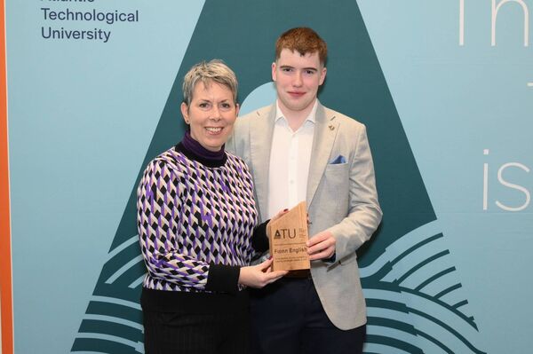 Achill native Fionn English receives an ATU Entrance Scholarship for Mechanical Engineering from ATU President, Dr Orla Flynn. Fionn previously attended Coláiste Pobail Acla.